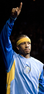 Allen Iverson gestures during standing ovation in pregame introductions.