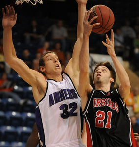 Ursinus' Nick Shattuck shoots over Amherst's Fletcher Walters.