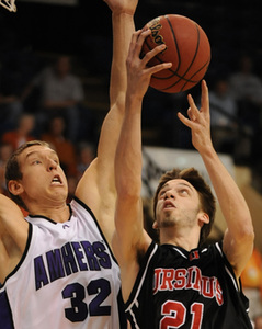 Ursinus' Nick Shattuck, who finished with 10 points, shoots over Amherst's Fletcher Walters in the first half in Salem, Va.