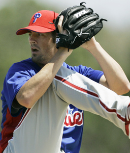 Phillies lefthander Cole Hamels delivers against Toronto. His line was not pretty: nine hits, five earned runs in 51/3 innings.