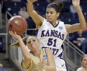 Chattanooga's Laura Hall (left) tries to shoot against Kansas State's Shalee Lehning in the second half. The Wildcats' victory snapped the Mocs' 24-game winning streak.