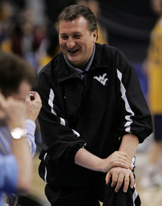 West Virginia coach Bob Huggins did notdo things by the books when he coached Cincinnati - at least not by the school books.