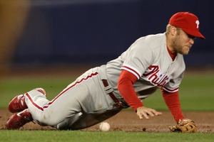 PHILLIES SHORTSTOP Eric Bruntlett, filling in for injured Jimmy Rollins, slips and makes error on ball hit by Mets' Jose Reyes. The Phillies lost to the Mets at Shea Stadium, 8-2, ending their nine-game winning streak against New York. To read David Murphy's game story, go to: http://www.philly.com/dailynews/sports