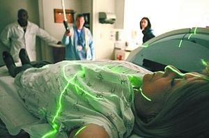 The green lines position Dorothy Hall for her breast-cancer radiation treatment at Penn's Abramson Cancer Center.