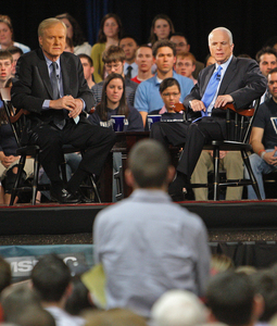 On a stage at Villanova University , Sen. John McCain (right) and "Hardball" host Chris Matthews listen to a question from student Matthew Brady.