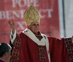 Pope Benedict XVI greets the crowd at Nationals Park in Washington. Thousands were on hand yesterday as he celebrated Mass at the stadium.