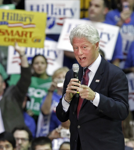 Bill Clinton addresses his wife's campaign supporters at the Palestra on the Penn campus Monday night.