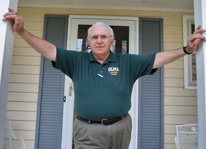 Tom McCarville, a former umpire, is instrumental in selecting teams to play in the Hammonton Invitational softball tournament. His daughters played in the popular tournament in 1987.