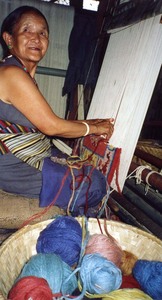In 2000, a Tibetan woman at her loom in Kathmandu made an appeal to a visitor that seems current today.