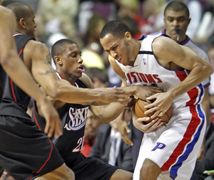 Thaddeus Young gets a jump ball with Detroit Pistons' Tayshaun Prince during the third quarter.