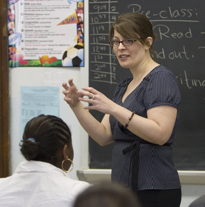Gina Hart is shown teaching in her classroom yesterday at William W. Bodine High School for International Affairs. The 29-year-old teaches English to ninth- and 11th-graders.