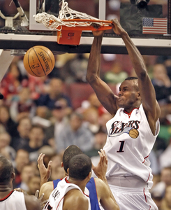 Sixers center Samuel Dalembert slams for two of his eight points in Game 6 against Pistons.