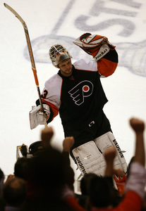 Flyers goalie Marty Biron celebrates win in Game 4 with fans at Wachovia Center.