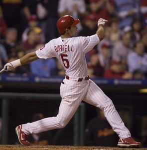 The Phillies' Pat Burrell blasts the game-winning two-run home run in the bottom of the 10th inning against the Giants. It was his third career walk-off homer.