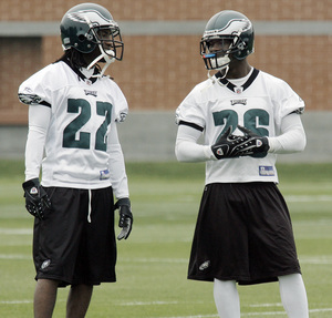 Eagles cornerbacks Asante Samuel (22) and Lito Shepaprd chat during minicamp. Sheppard shared playing time with Samuel and Sheldon Brown on the first-team defense.