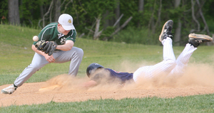 Cardinal O'Hara's Bill Pace slides safely into third base against Bonner's Dan Haley.