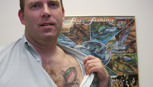Scott Camilleri displays the rainbow-trout tattoo that covers the scar from his mastectomy surgery.