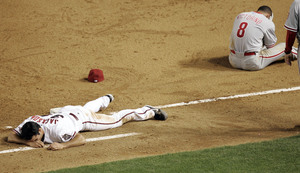 Diamondbacks' Conor Jackson and Phillies' Shane Victorino are left reeling after collision.