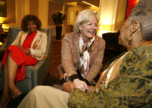 Nora Dowd Eisenhower, Pennsylvania&acute;s secretary of aging, talkswith Berneatha Brown (right) at an AARP event. At left is Brenda Foster.