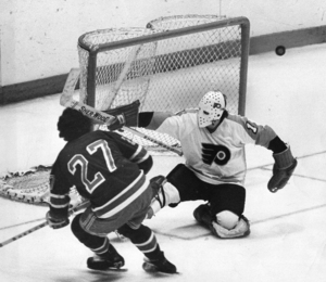 Bernie Parent makes a save during Flyers' playoff series victory over Rangers in 1974.