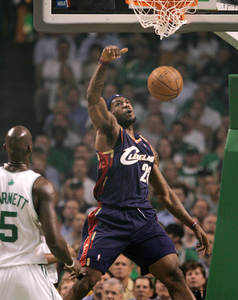 Cleveland's LeBron James dunks after getting past Boston's Kevin Garnett during last night's Game 2 of the Eastern Conference semifinals in Boston.
