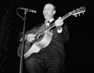 Eddy Arnold performing at Madison Square Garden in New York in a 1959 photograph. He was the first person to win CountryMusic Association honors as entertainer of the year, in 1967.