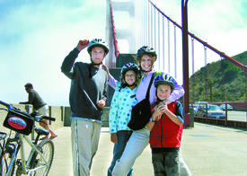 With mother Anne Kassekert Kohart on the Golden Gate Bridge (from left): Jeff, Lauren, Peter.