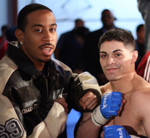 Ludacris (left) with fighter Joe Camacho on BET's "Iron Ring." The network says it's among its top programs.