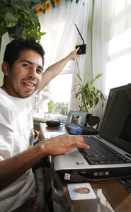 Efrain Herrera soon won't have to point his wireless router out the window anymore - but then again, he won't have EarthLink access after June 12.