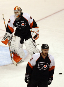 Martin Biron, Jeff Carter look dejected after Pens goal in Game 3.