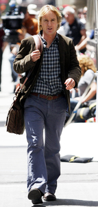 Owen Wilson (above) plays former columnist John Grogan in "Marley & Me." He's shown during filming at Broad and Walnut streets yesterday afternoon.