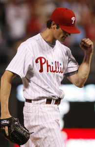 Cole Hamels celebrates strikeout in ninth inning.