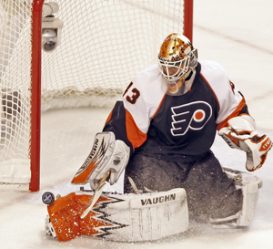 Flyers goaltender Martin Biron stops the puck in the second period.