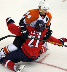 Kimmo Timonen, taking down Caps' Brooks Laich in first round, could play tomorrow.