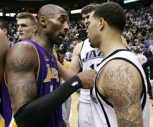 Kobe Bryant (left) has a word with Deron Williams of the Jazz after the Lakers' 108-105 Game 6 win Friday night in Salt Lake City eliminated Utah. Bryant had 34 points in the game.