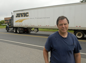 George Meehan, a driver for Jevic, stands outside the Delanco headquarters. Meehan, who was hired last year, said that workers were unaware the firm was about to close.