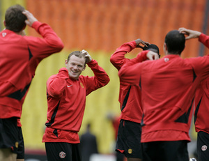 Man U star Wayne Rooney seems a bit confused during practice.