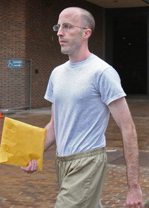 Matthew Kevin Montgomery leaves the U.S. courthouse in Phila. after appearing.