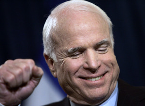 Republican Sen. John McCain acknowledges supporters while speaking in Miami.