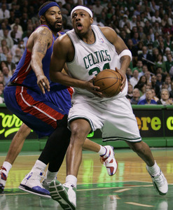 Boston's Paul Pierce moves through the lane past the Pistons' Rasheed Wallace during the Celtics' 15th straight home win.