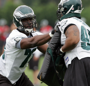 Eagles end Victor Abiamiri (left) hopes to make as big a splash this season as former college teammate Justin Tuck made with the Giants last year.