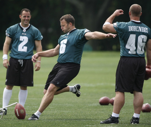Kicker David Akers, punter Sav Rocca, long snapper Jon Dorenbos work out at practice yesterday.