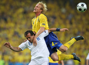 Sweden's Petter Hansson goes over Greece's Theofanis Gekas during Sweden's win in a Euro 2008 first-round match in Salzburg.