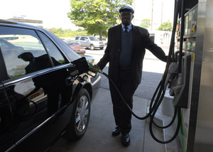 The Rev. J. Barrett at a Philadelphia pump. Drivers spent 2.6% more on gas in May, but it cost more, so they actually bought less of it.