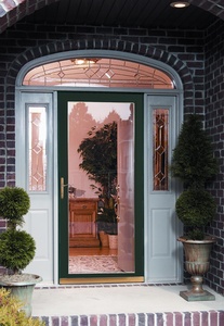 Seeking security and a good looks, Tim and Anne Nelson chose a Secure Elegance storm door like the one at left for their house in Summerfield, N.C. It has a full-view panel with break-resistant glass and a 3-point locking system.
