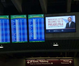 Just in case Homeland Security has out-of-towners rattled, causing them to forget momentarily where they're landed, a happy Mayor Nutter is happy to oblige with the information, his smiling visage beaming from more than 40 signs and video screens throughout Philadelphia International Airport.