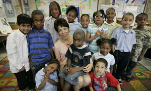 Erlene Bass Nelson, surrounded by her last kindergarten class at Drew Elementary in University City, has spent more time in the Philadelphia school district than any teacher in recent memory.