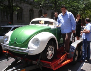 Chef Jose Garces with a Volkswagen Beetle that will be a booth at his new restaurant, Distrito, opening in late July.
