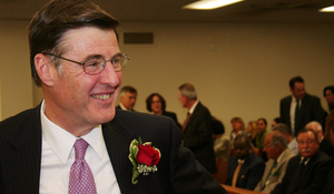Warren Faulk smiles before the ceremony where he was sworn in as Camden County's new prosecutor yesterday.