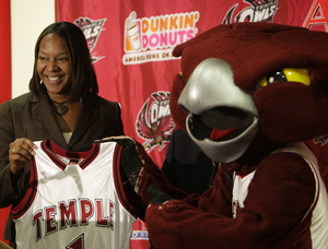 New Temple women's basketball coach Tonya Cardoza shares spotlight with Owls' mascot.